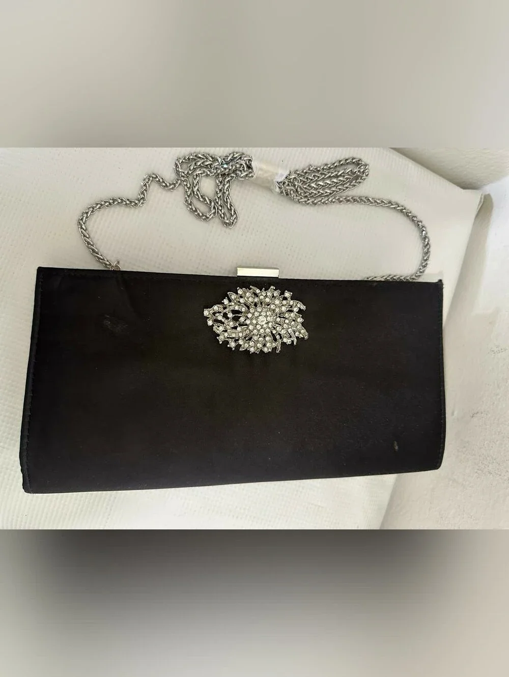 Women Black Papell Clutch Features  Prominent Crystal-embellished Brooch Closure